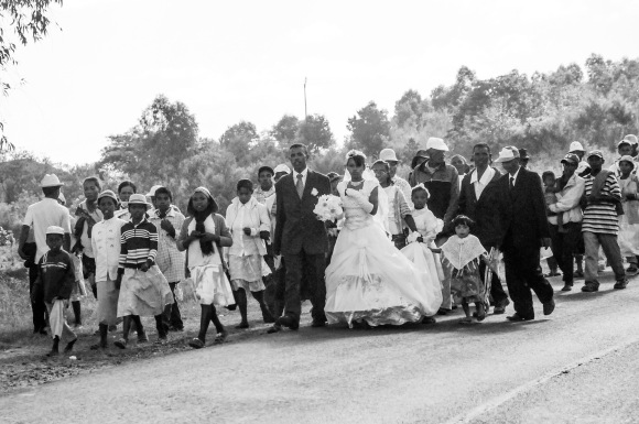 We encountered a tradition where the wedding attendants all walk together to the church.